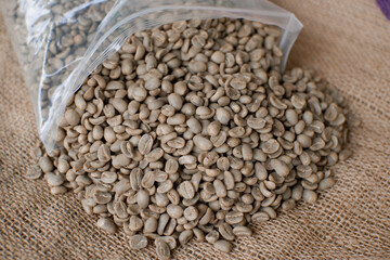 raw coffee beans or green beans. top view of coffee with fullwash method ready to be roasted 