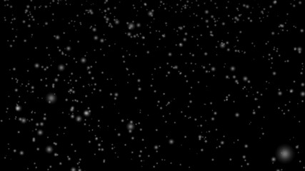 snow fog on a black background. abstract Flying dust particles on a black background. Vast snow...