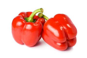 Stock photo of two red bell peppers on a white background