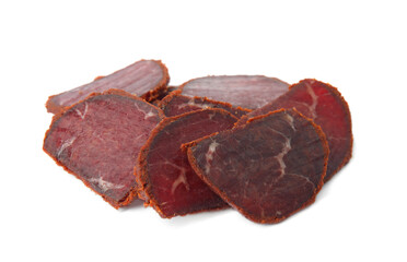 Delicious dry-cured beef basturma slices on white background