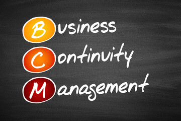 BCM - Business Continuity Management, acronym business concept on blackboard