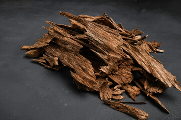 Close UpShot Of Sticks Of Oudh On Black Background 