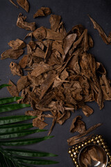 Close UpShot Of Sticks Of Oudh On Black Background 