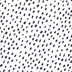 Abstract black and white dots seamless pattern. Hand drawn brush stroke splashes elements. Polka dot textured backgroung for textile, cover, wrapping paper, wallpaper design