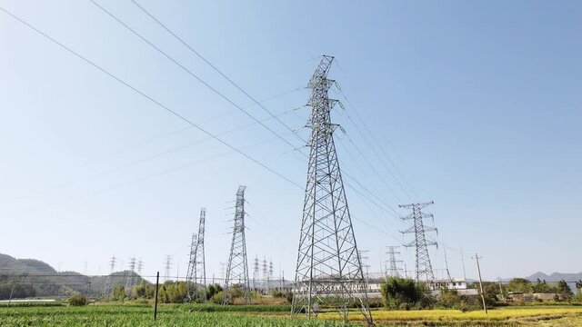 aerial view of transformer substation and high voltage tower