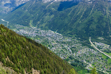 The town of Chamonix in the Mont Blanc valley in the Mont Blanc massif in Europe, France, the Alps, towards Chamonix, in summer on a sunny day.