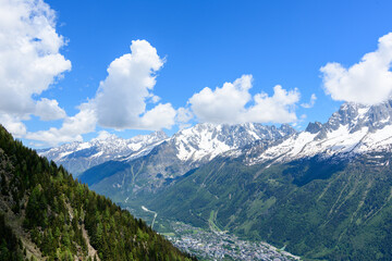 Clouds over the town of Chamonix in the Mont Blanc massif in Europe, France, the Alps, towards Chamonix, in summer, on a sunny day.