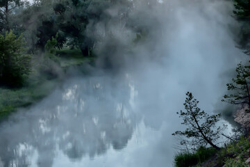 River in foggy dusk. Selective focus, shallow depth of field