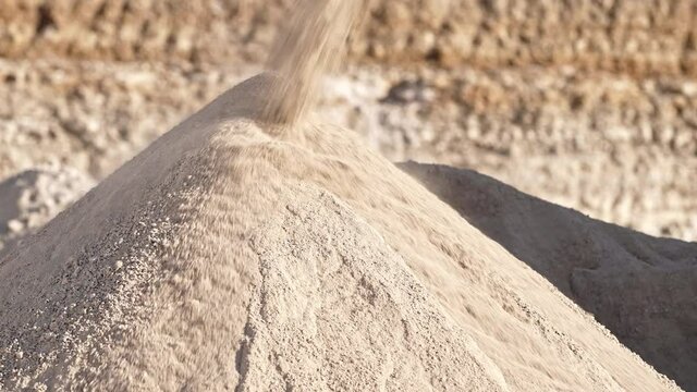 Mining conveyor belt sorts sand and loading stones on bunch. Mobile portable crushing screening plant. Heavy machinery working for minerals extraction. Mining extractive industry.