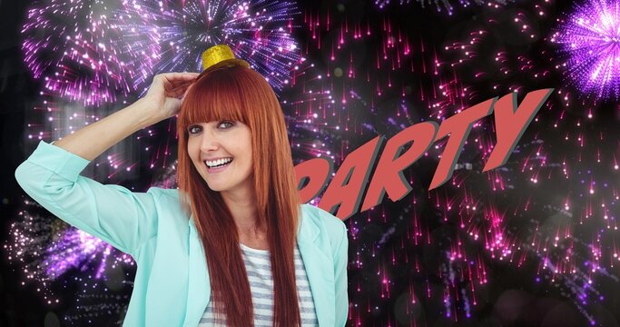 Digital composite image of smiling redhead woman enjoying by party text over fireworks