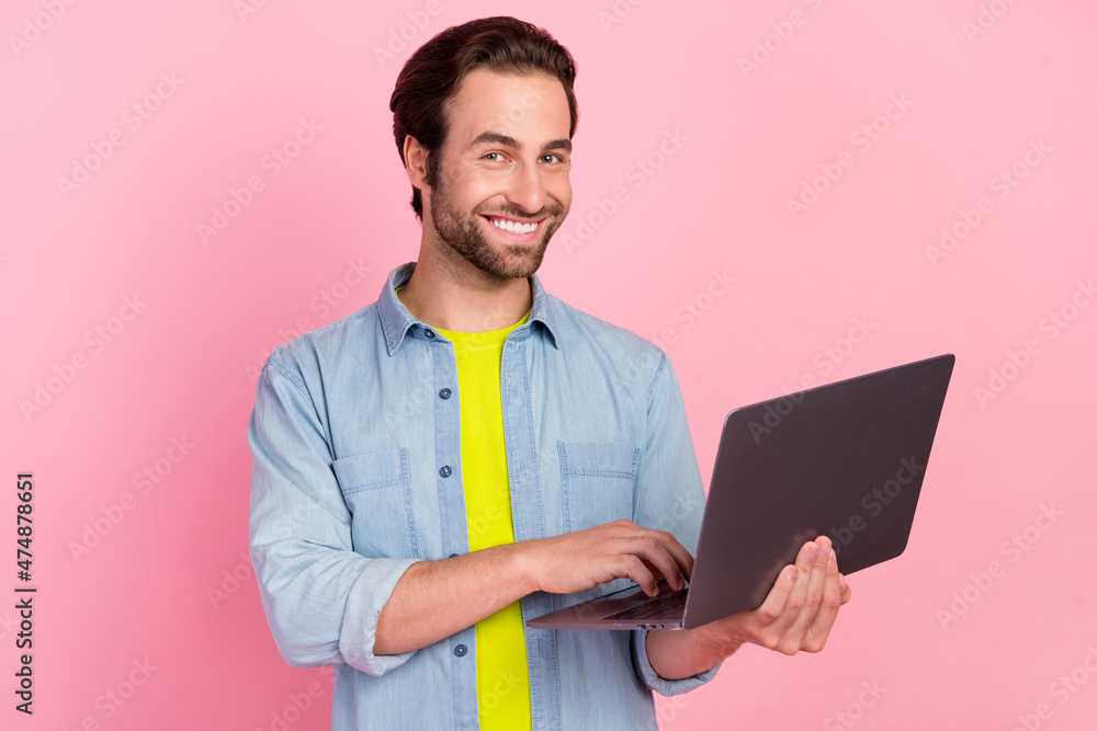 Sticker Photo of young man use laptop boss coach expert type report economist isolated over pink color background