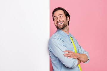 Profile side photo of young cheerful guy promoter look empty space advertise billboard isolated...