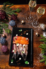 .Herring salad with mayonnaise on the wooden table