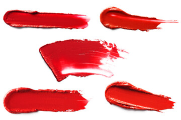Red smudged lipstick isolated on white background.