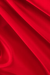 draped red silk fabric of satin weave, texture, background