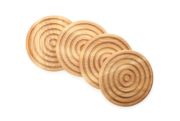 Wooden cup coasters on white background, top view
