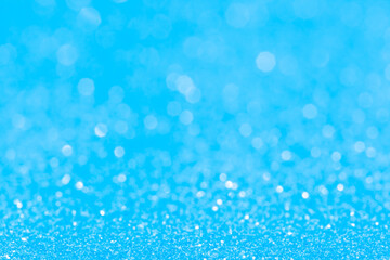 sparkles of Blue glitter abstract background. Copy space
