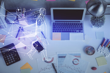 Start up theme drawing over computer on the desktop background. Top view. Double exposure....
