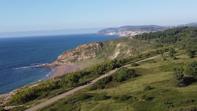 aerial footage of cliffs in the sea, in the coast of the basque country