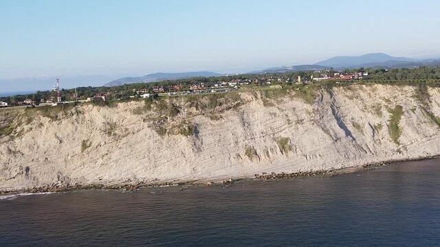 aerial footage of cliffs in getxo, in the basque coast