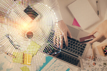 Double exposure of man's hands typing over computer keyboard and brain hologram drawing. Top view. Ai and data technology concept.