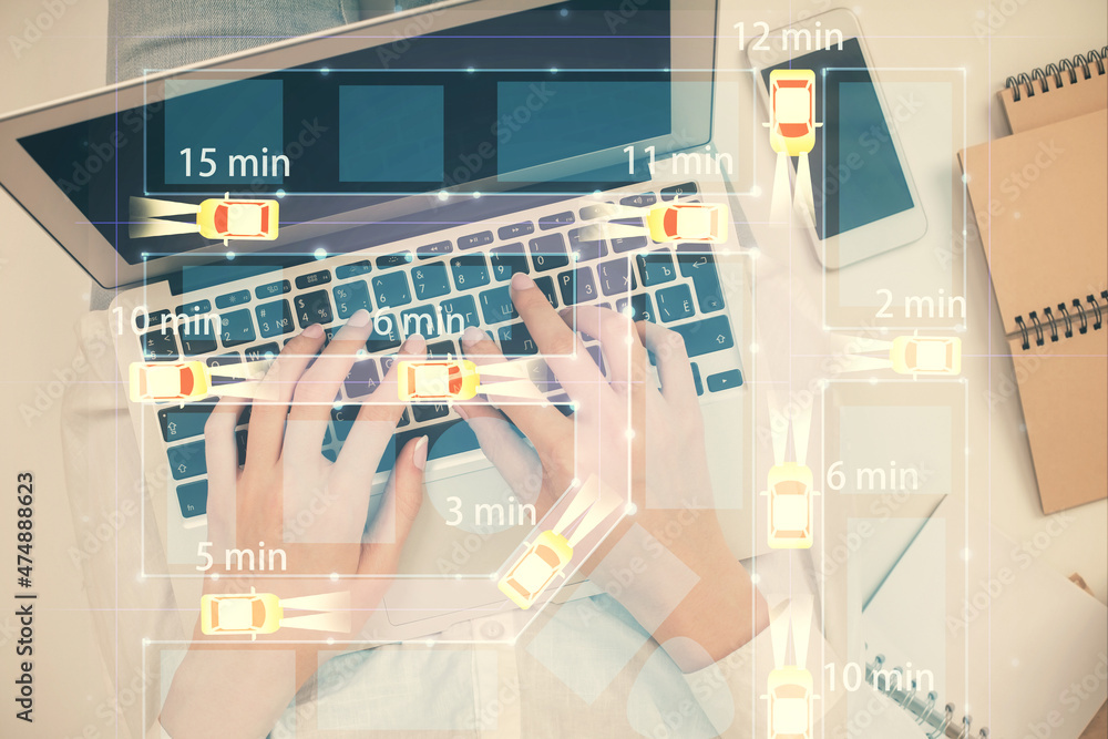 Poster double exposure of woman hands working on computer and car hologram drawing. top view. auto pilot co
