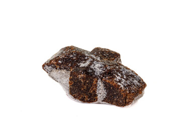 macro mineral stone Staurolite on a white background