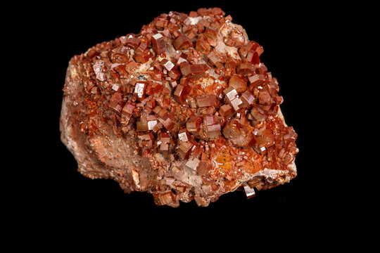 Macro mineral stone Vanadinite on a black background