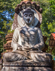 Bangkok, Thailand - 04 Dec 2021 : Ancient Buddha Statue at Wat Pa Sawang Bun Saraburi Province. Selective focus.