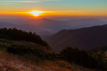 Sunset in the Carpathians, Gorgan region, Ukraine. Tourism and mountains concept. Magical sunset in the mountains.