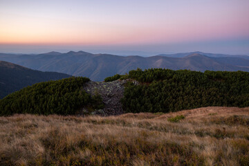 Fototapeta premium Magical sunset in the Carpathians overlooking the Krasna mountain range, Gorgany region, Ukraine. Tourism and mountains concept.