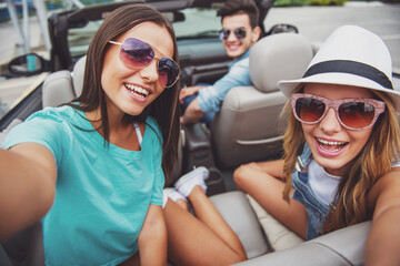 Friends in cabriolet