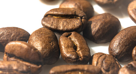 Coffee beans lying on a white background.Close-up.Macro