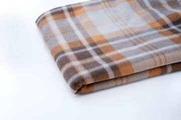 Blanket with a pattern isolated on gray.