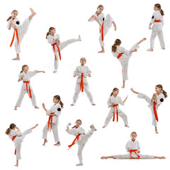 Development of movements in sport training. Little girl, young karate training alone isolated over...