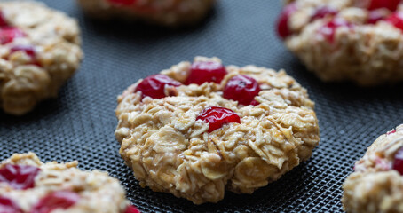 The process of making dietary oatmeal cookies with banana and cranberries. Vegan food