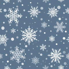 Fototapeta na wymiar Ornamental snowflakes on grey background seamless pattern