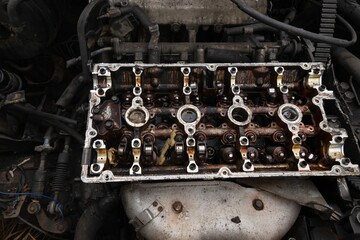 Broken open Cracked car auto engine, damaged bare detail