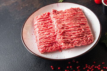 ground meat fresh minced meat pork, beef, lamb cutlets or meatballs healthy meal food diet snack on the table copy space food background rustic. top view