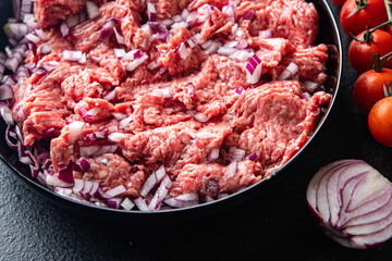 ground meat fresh minced meat pork, beef, lamb cutlets or meatballs healthy meal food diet snack on the table copy space food background rustic. top view