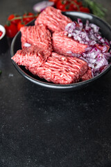 ground meat fresh minced meat pork, beef, lamb cutlets or meatballs healthy meal food diet snack on the table copy space food background rustic. top view