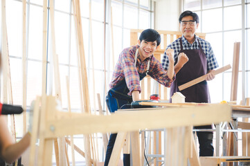 wooden workshop concept, carpenter team craftsman person working with a wood work construction tool