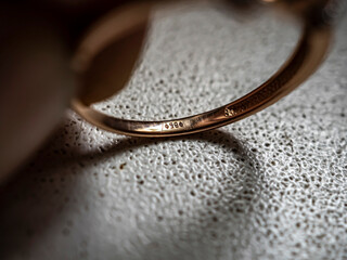 manufacturer's brand name on the gold product