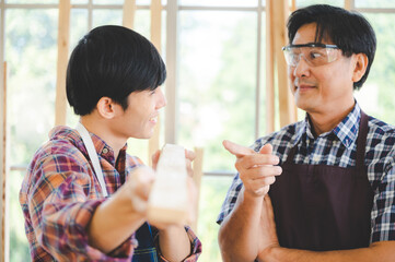 wooden workshop concept, carpenter team craftsman person working with a wood work construction tool