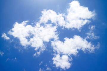 Beautiful Pure White Clouds Floating on Vibrant Sunny Blue Sky