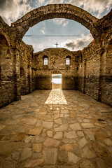 Obraz premium Sunken church St.Ivan Rilski is now above the water level of dam Zhrebchevo, Bulgaria