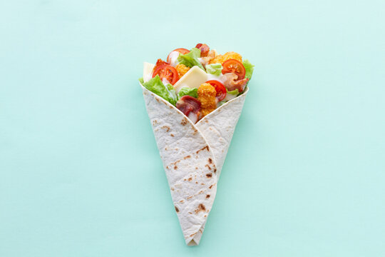 Chicken wrap with tomatoes and cheese