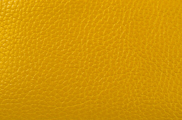 Golden leatherette texture background.