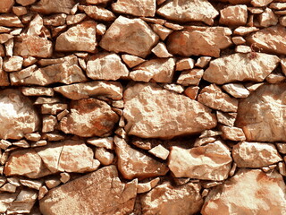 Stone wall texture background with different sized stones