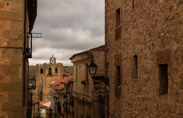 Fototapeta na wymiar Panorama of small town, Siguenza, Spain, with church tower in bakground
